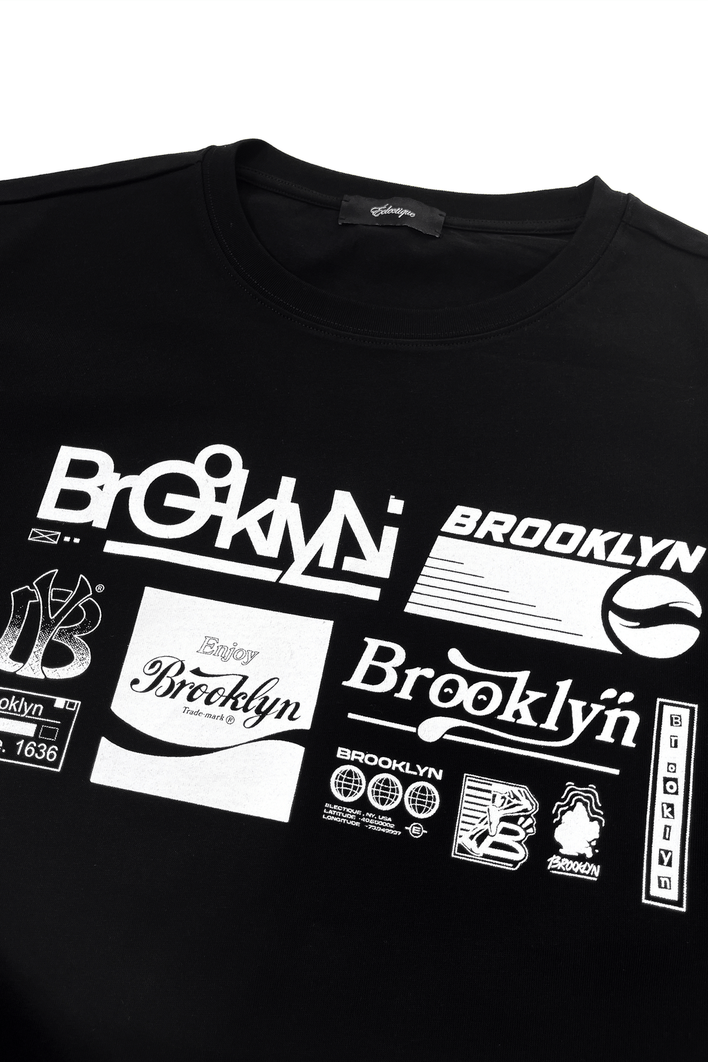 Brooklyn graphic t-shirt featuring printed white artwork on a black cotton tee, showcasing various Brooklyn designs.
