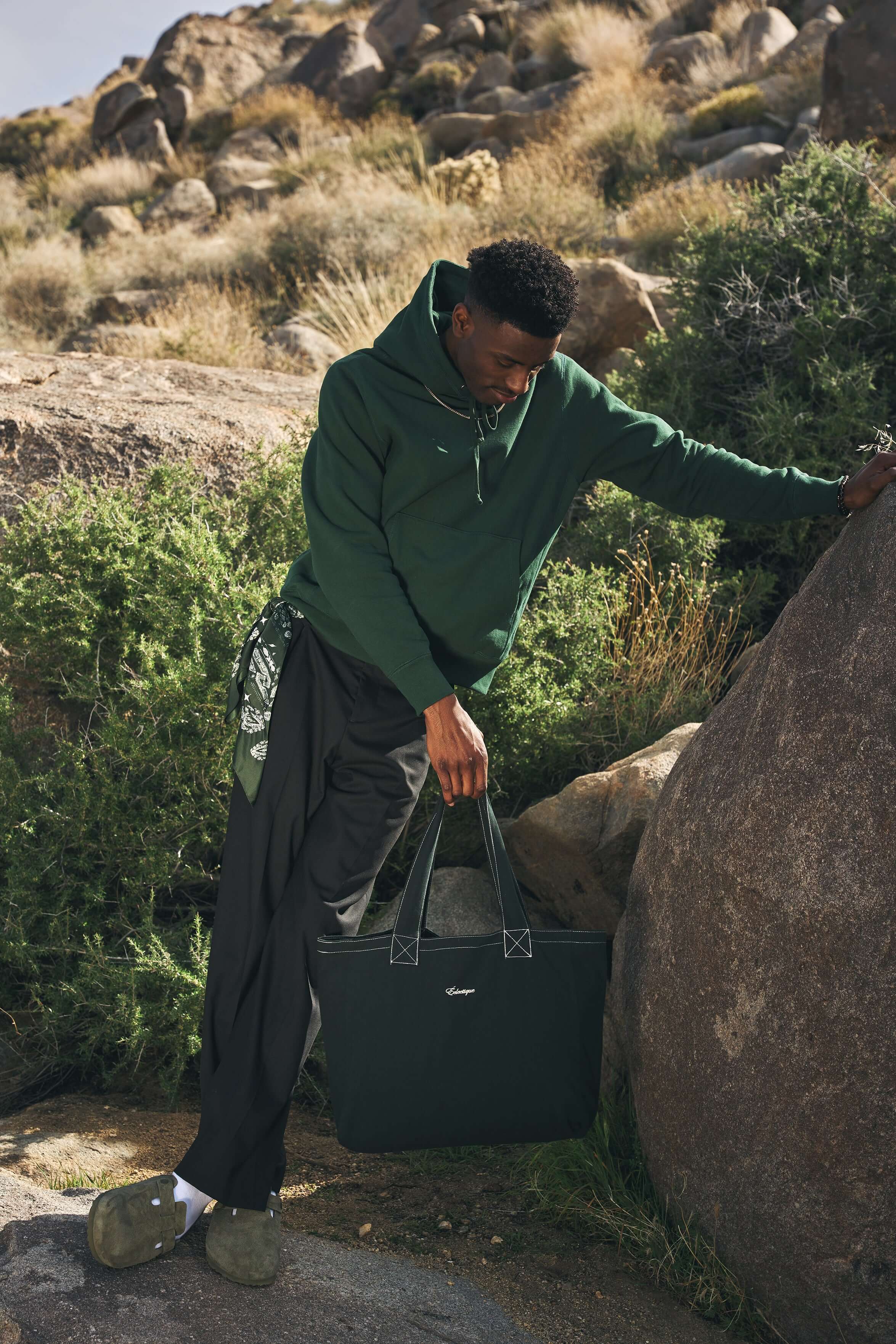 Éclectique scarab green canvas tote bag held by model