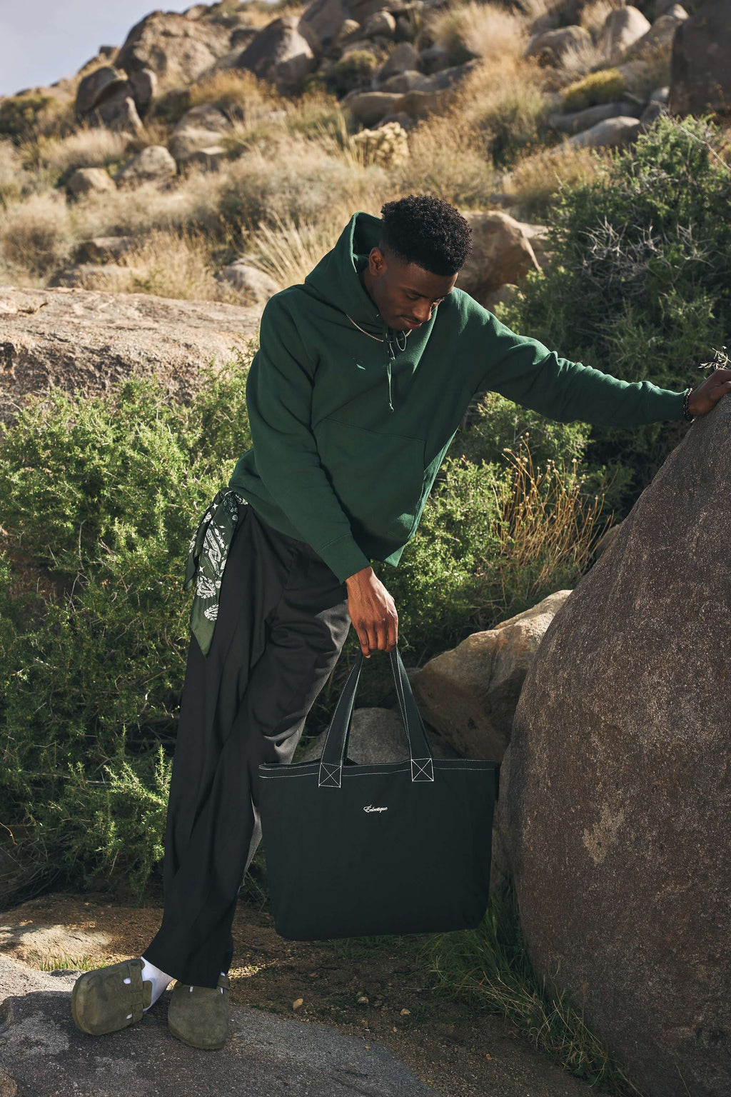 Éclectique scarab green canvas tote bag held by model