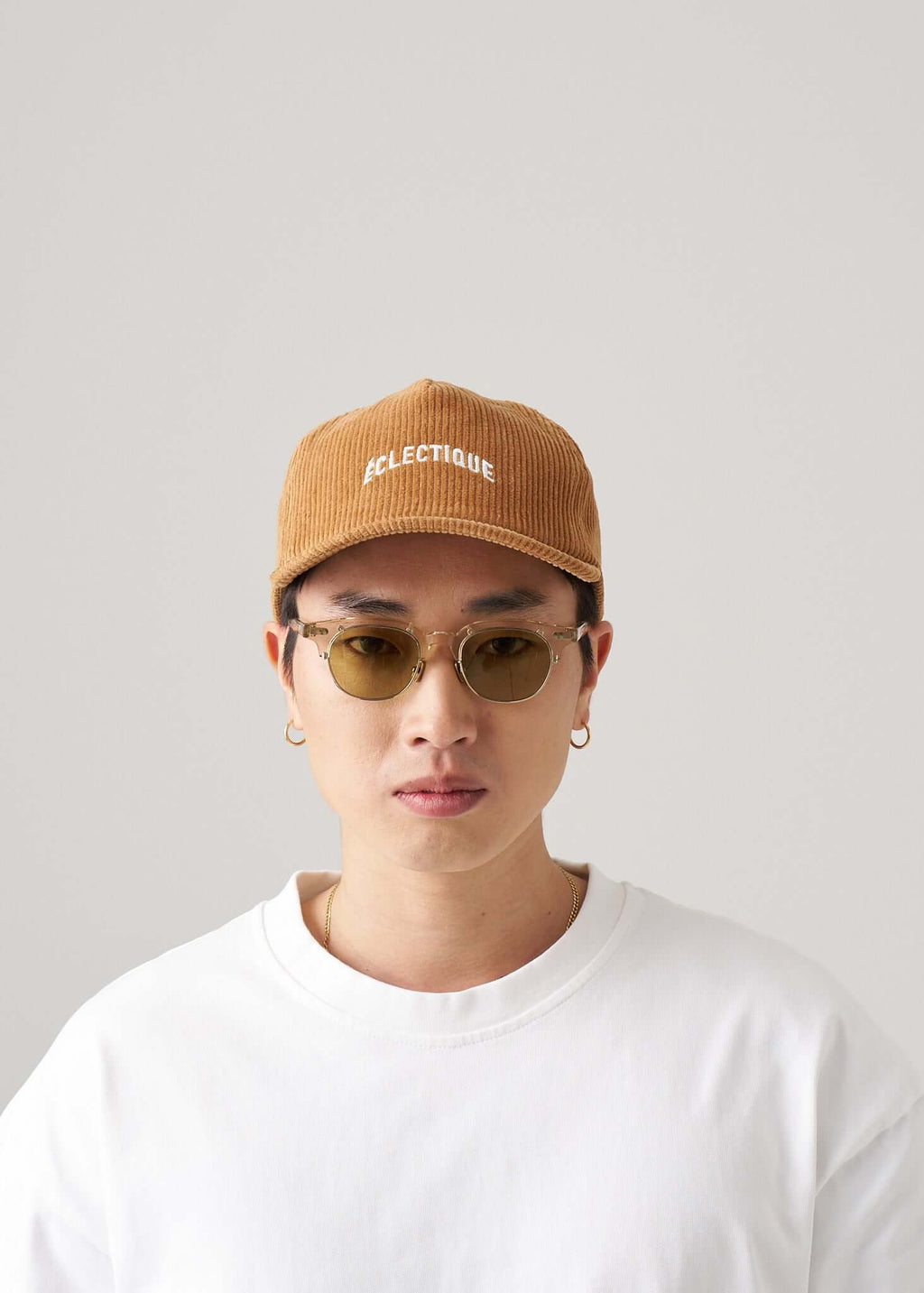 corduroy snapback hat in amber ash front view on model