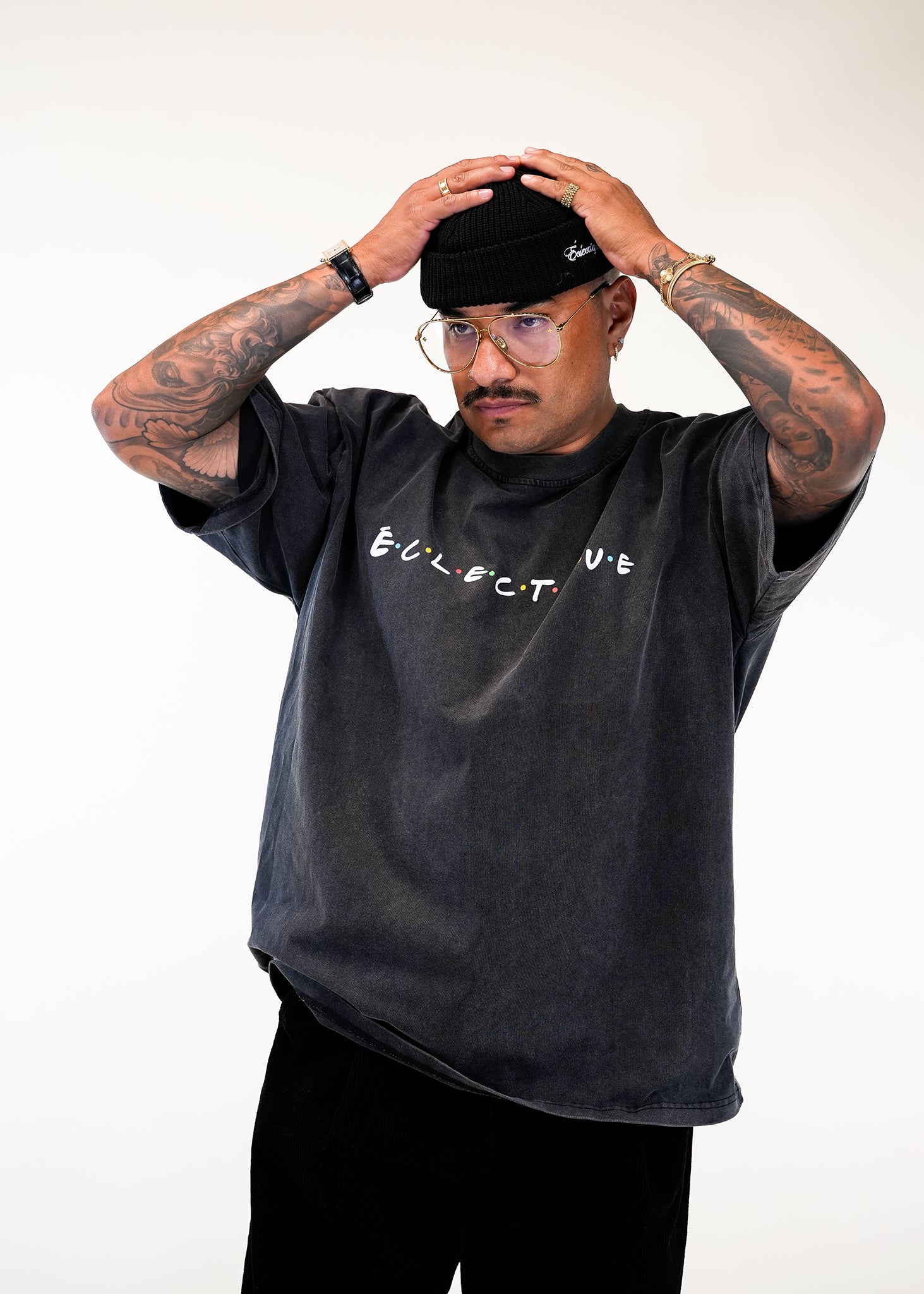 Model wearing Eclectique classic Friends logo t-shirt and beanie