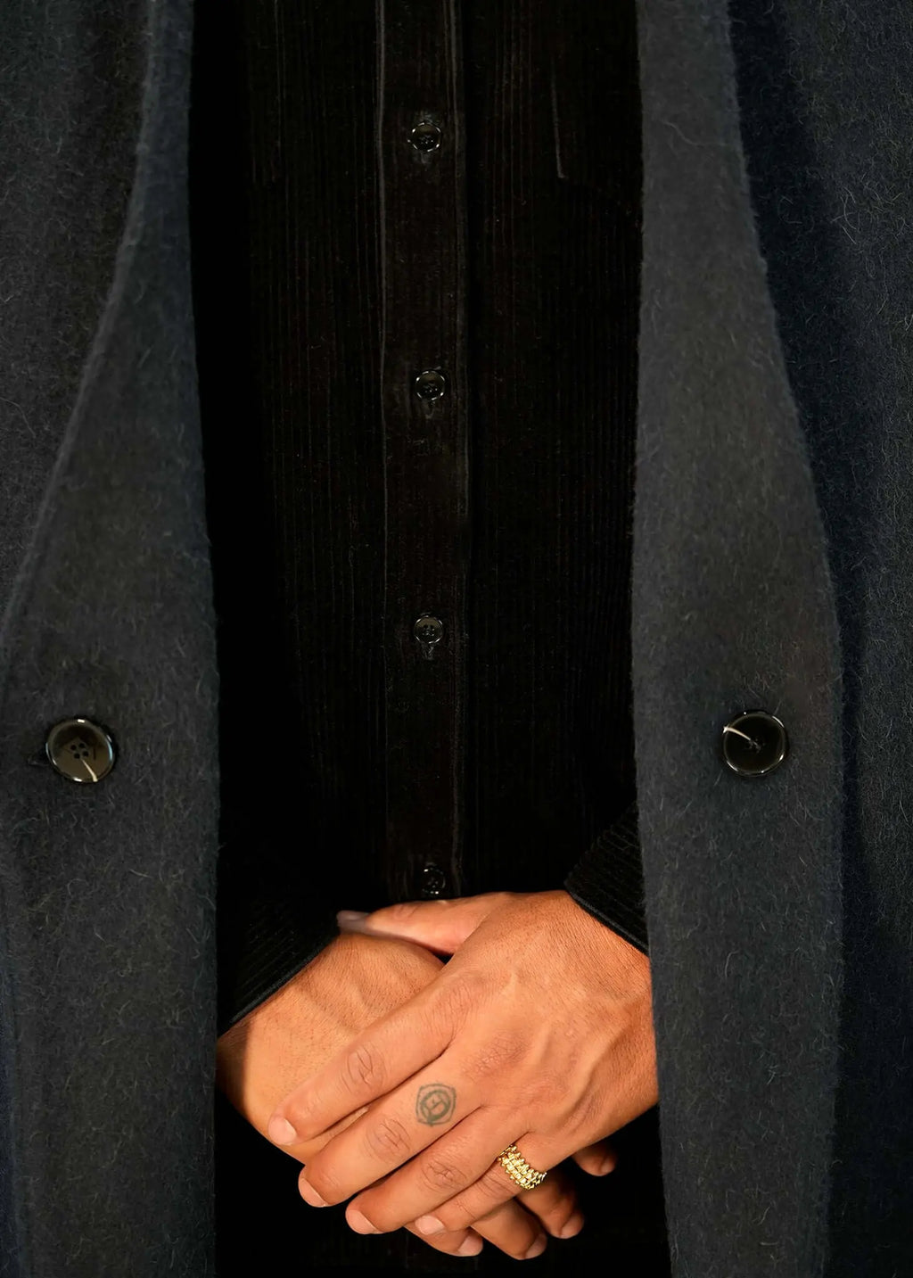 Close-up of Éclectique’s corduroy button-up shirt highlighting the soft ribbed texture and premium corduroy fabric.
