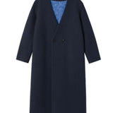 Kanso Collarless Long Coat in navy with clean lines and refined texture, showcasing minimal design.