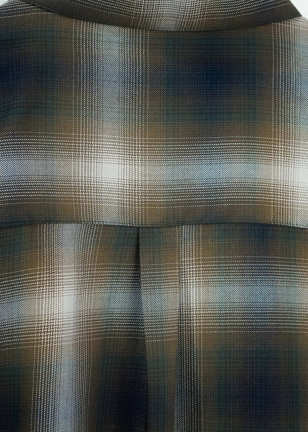 Close-up of the Mercer Plaid Cotton Button-Up Shirt showcasing its intricate plaid design and premium fabric texture.