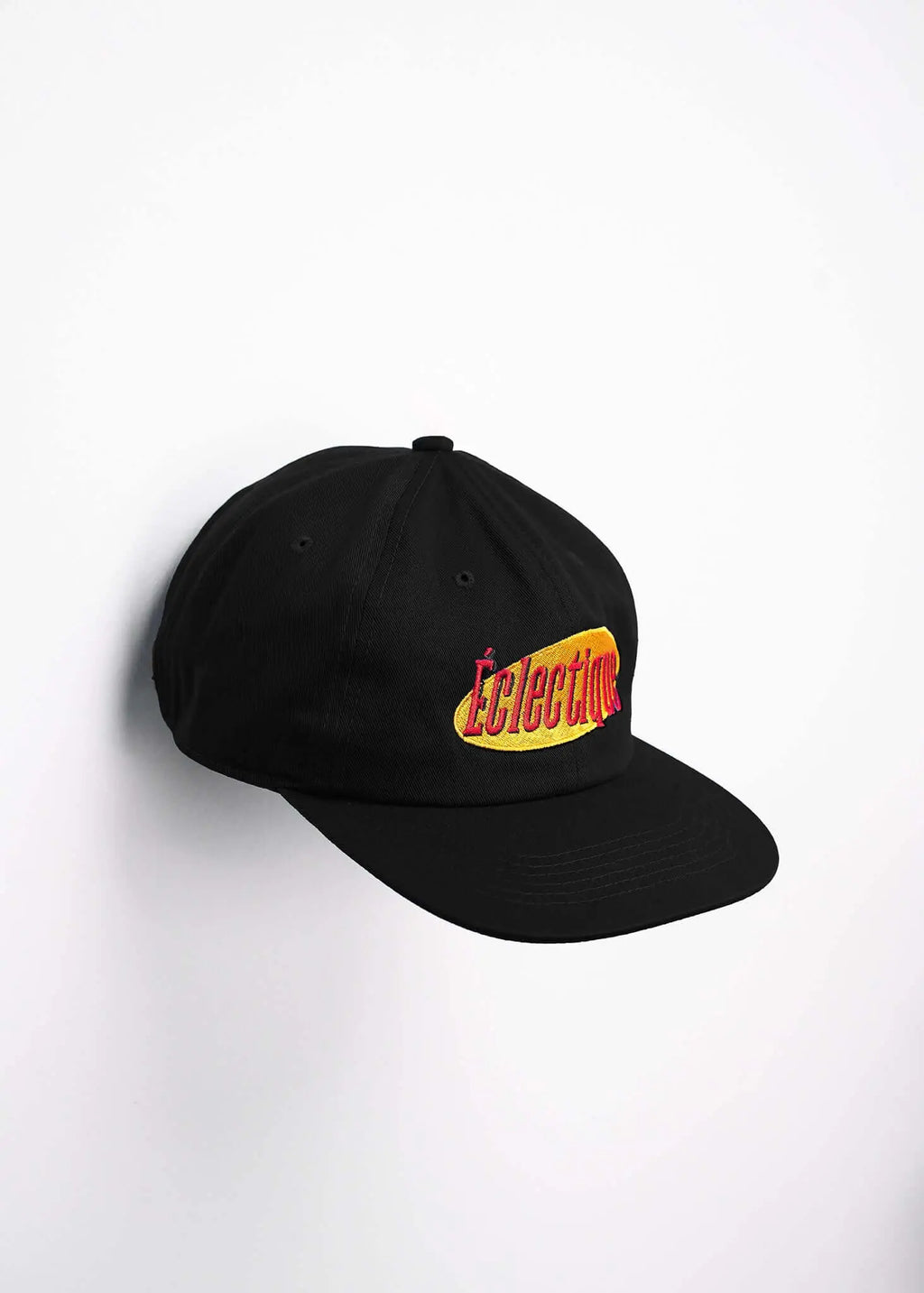 Seinfeld Vintage logo hat featuring embroidered Éclectique logo on a black unstructured cap.