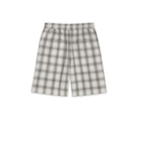 Tailored monotone plaid shorts featuring a refined silhouette and front pleats, made from 100% cotton.