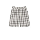 Tailored monotone plaid shorts with cream drawstring, front pleats, and four pockets for a refined silhouette.