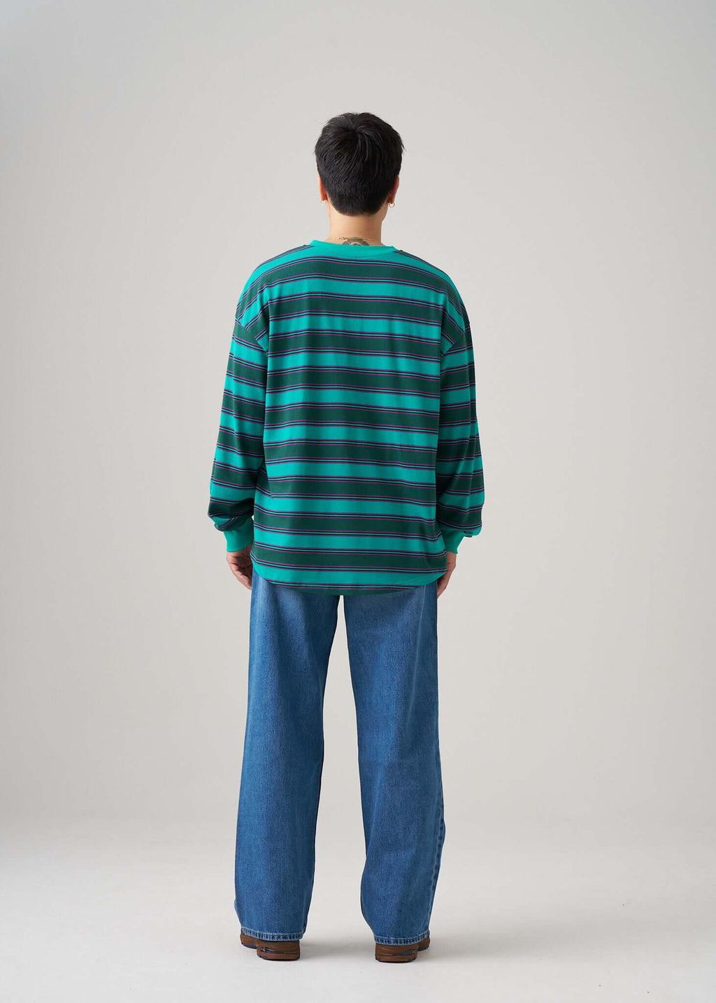 Long sleeve t-shirt in Emerald Drift pattern shown from the back, featuring soft cotton and a relaxed fit.