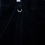 Close-up of Pleated Corduroy Trousers showcasing tailored pleats and premium fabric detail.